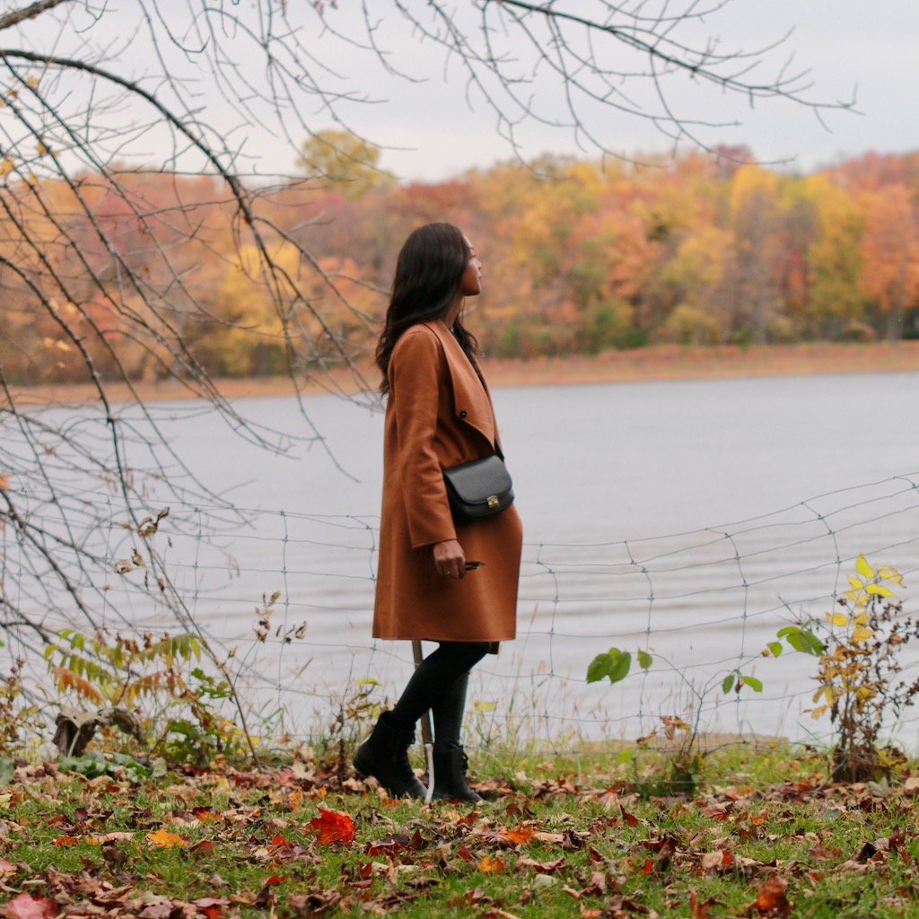 Sharifa Samora looking at the water during fall